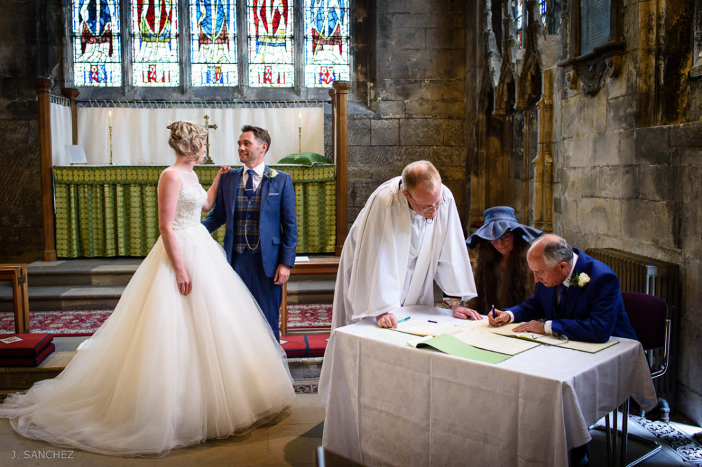 BOLTON PERCY WEDDING, SIGNING THE WEDDING REGISTRY.